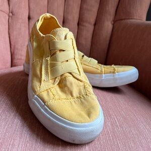 Yellow slip-on sneakers